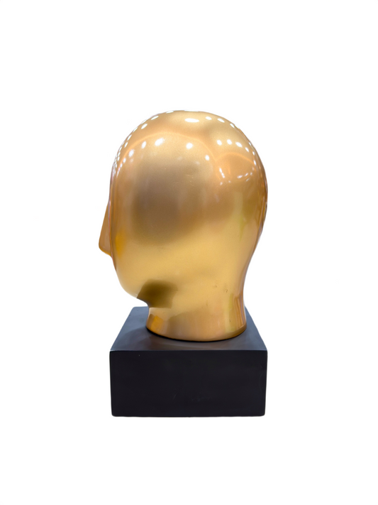 Left side angle of Golden Abstract Face sculpture with sleek golden finish