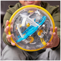 "Child playing with PERPLEXUS Beast 3D Maze Game – Screen-Free Puzzle Toy"