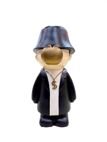 Front view of 9.5 inch resin showpiece in black coat with golden apple face and dollar chain, modern art figurine for home décor