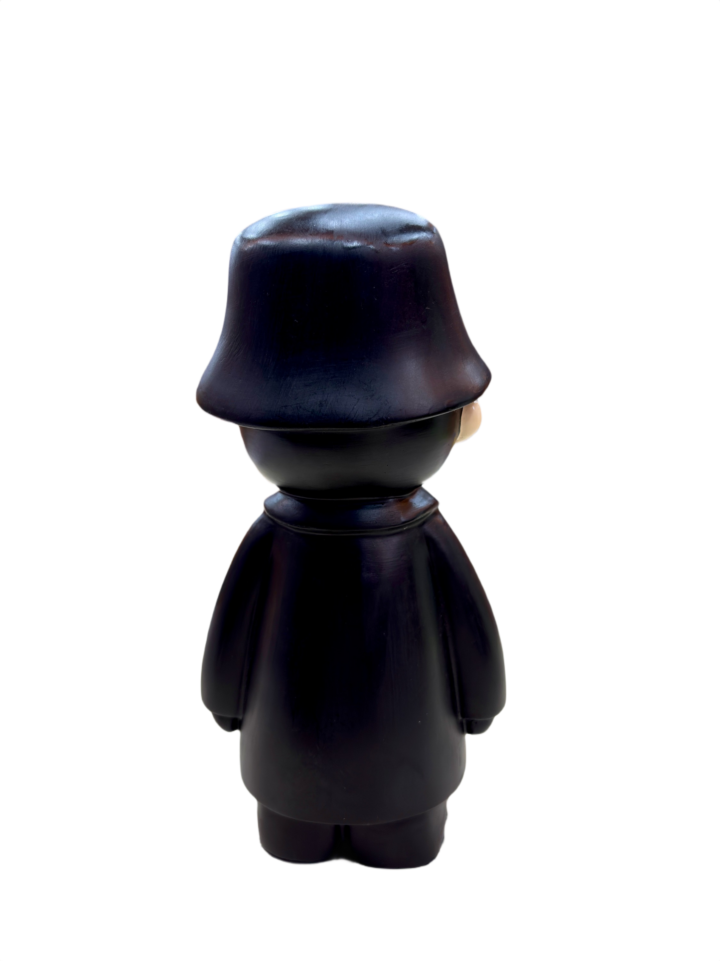 Back view of 9.5 inch resin showpiece figurine in glossy black coat and hat, modern art collectible for home and office décor