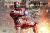 Red and silver Iron Man figure from Marvel's Iron Man 2 with blurred cityscape background