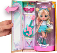 Stella Fashion Doll holding turquoise guitar and wearing sparkling outfit