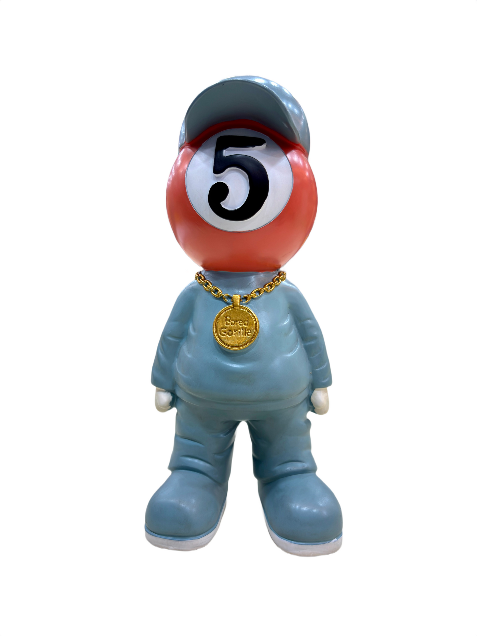 Close-up of Bored Gorilla figurine’s gold chain with engraved medallion