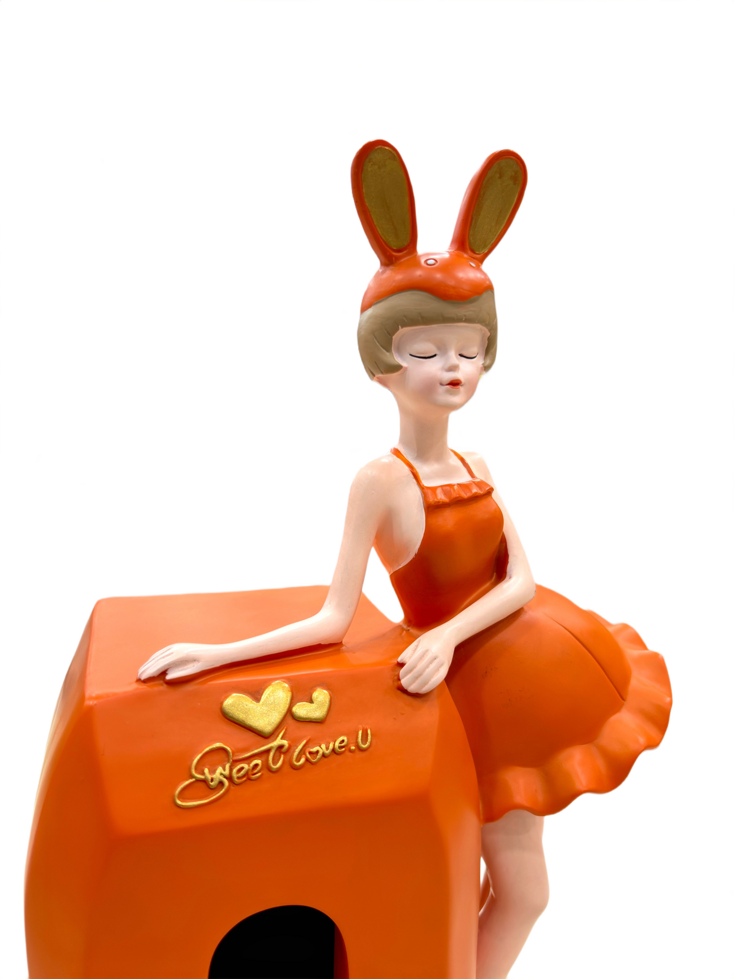 Close-up of Bunny Girl figurine’s orange dress with fine detailing
