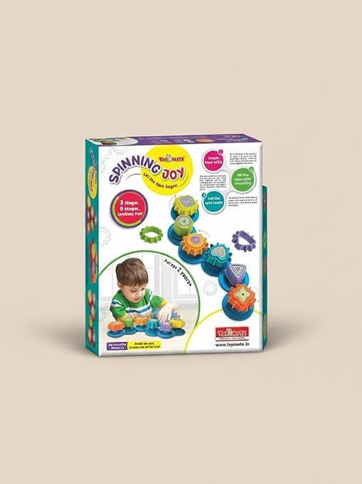 Child playing with colourful interlocking gear spinning toy — educational creativity toy