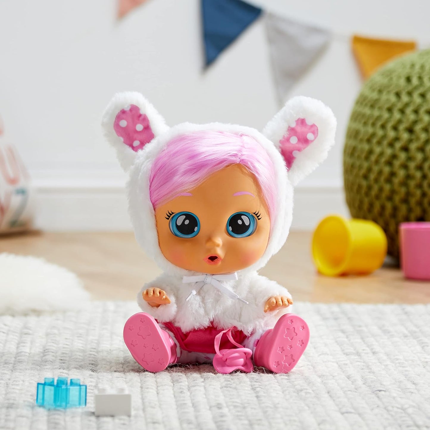 Child playing with Cry Babies Dressy Coney Doll during pretend play