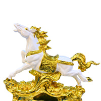 Close-up of detailed handcrafted golden horse sculpture with glossy finish