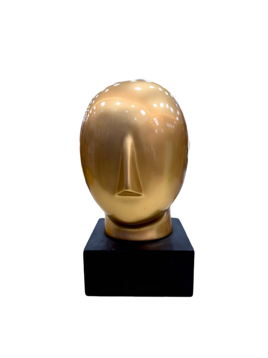 Front view of Golden Abstract Face 10.5-inch modern decorative showpiece on black base