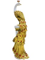 White poly stone peacock pillar showpiece with golden accents and red gemstone details