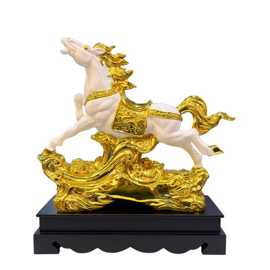 Front view of handcrafted golden running horse statue made of polystone