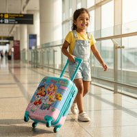 Interior view of kids hard shell trolley bag showing blue lining cross packing straps and zippered inner pocket