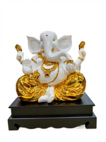 Golden Polystone Sitting Ganesha Idol – Hindu God Statue for Home Mandir & Spiritual Gift