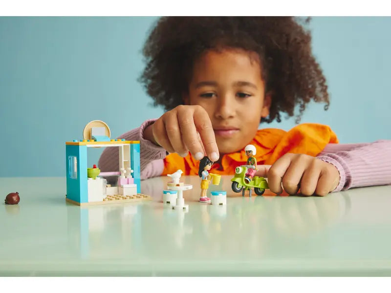 LEGO Friends donut café with table, chairs, and counter