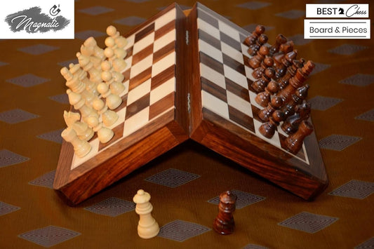 Magnetic wooden chess pieces displayed on polished board