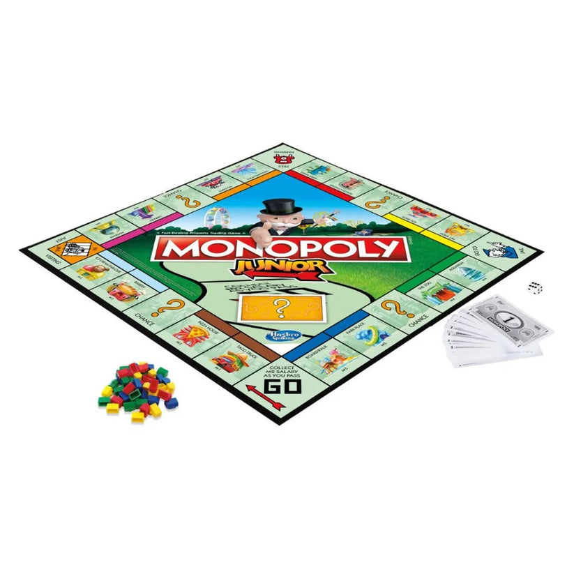 Kids smiling and playing Monopoly Junior board game together.