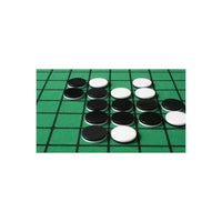 Close-up view of black and white Othello game discs.