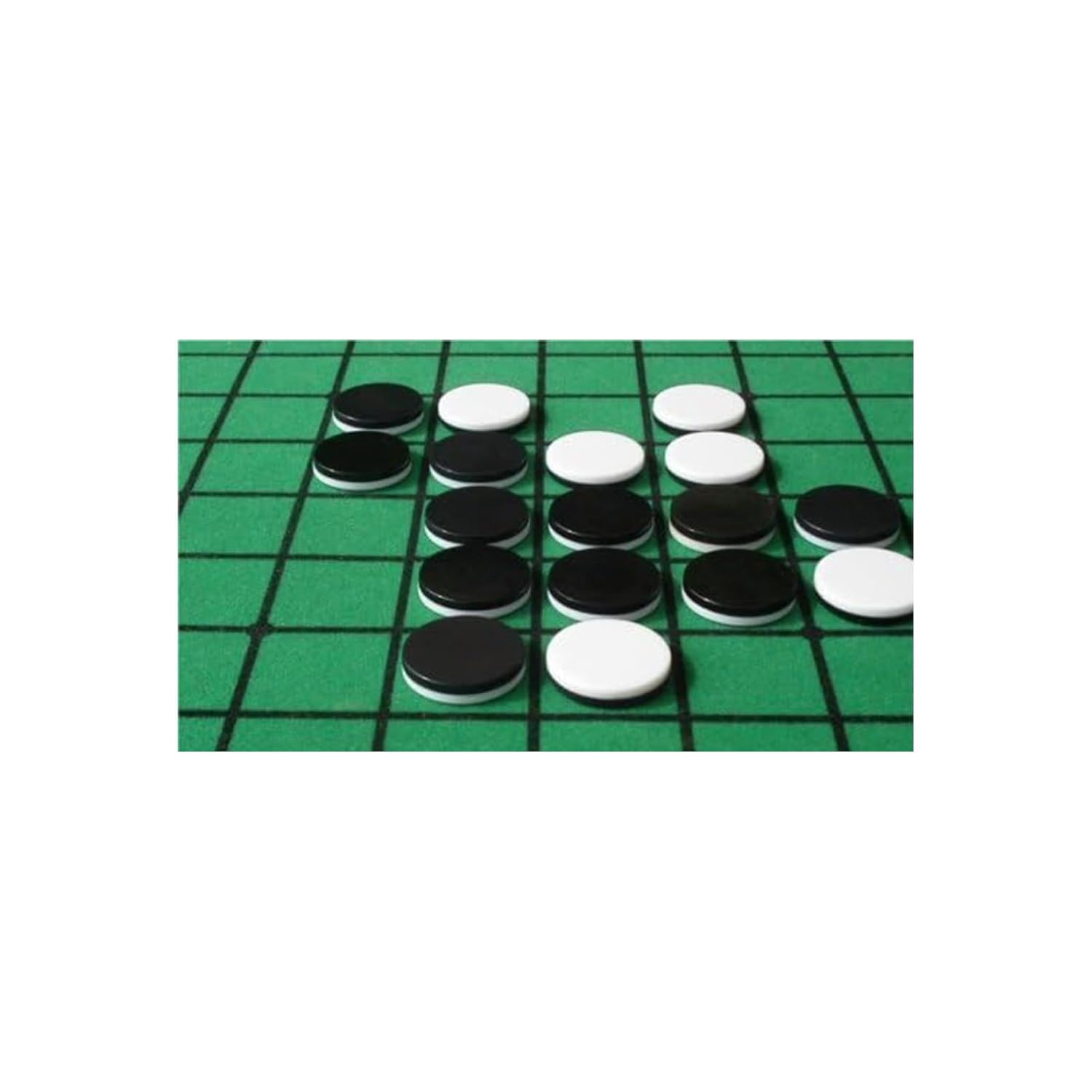 Close-up view of black and white Othello game discs.