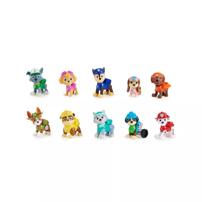 Children playing with Paw Patrol All Paws Gift Set collectible toys.