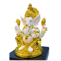 “Resin Lord Ganesha murti in white and gold finish – spiritual décor and auspicious housewarming gift.”
