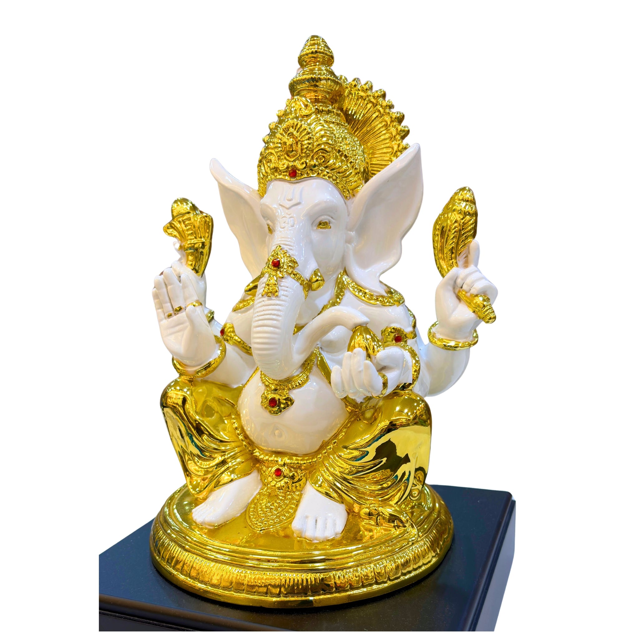 “Resin Lord Ganesha murti in white and gold finish – spiritual décor and auspicious housewarming gift.”