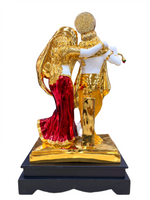 Back Close up of Radha Krishna flute idol with intricate hand painted resin artwork and golden accents devotional statue