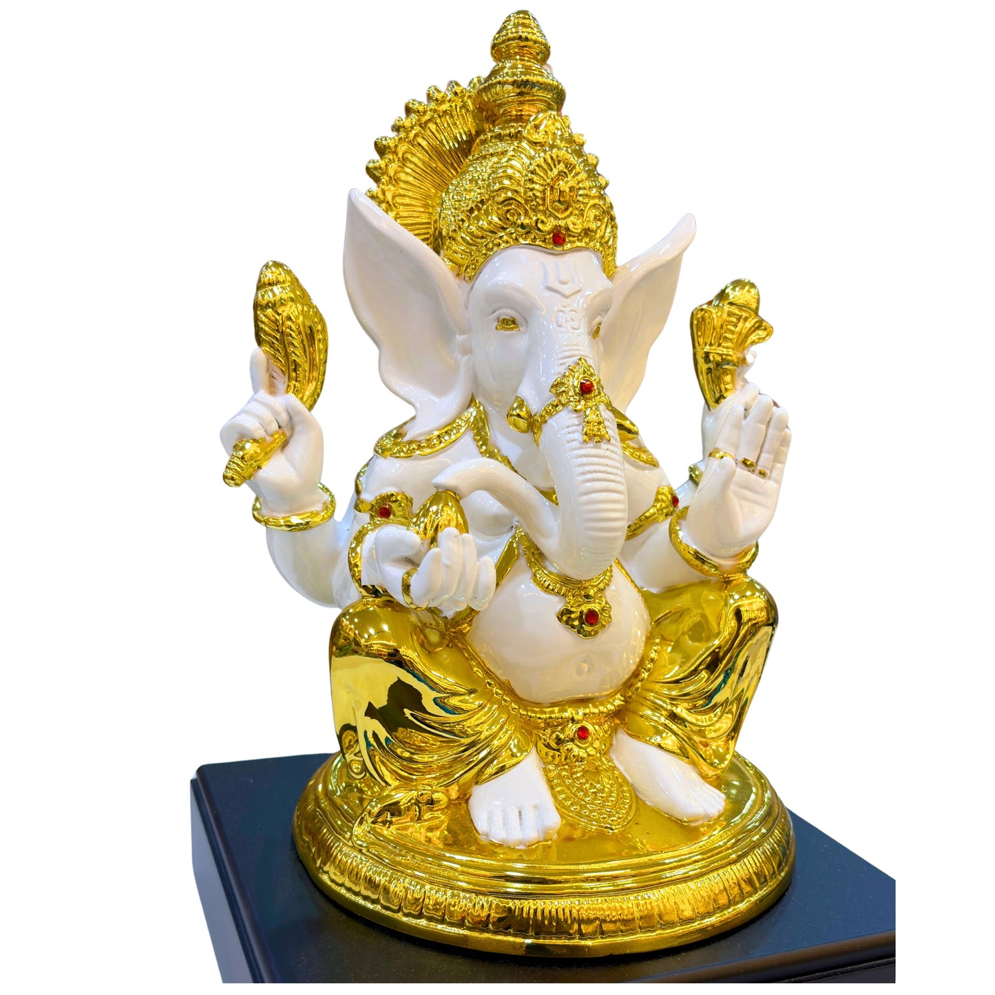 “Elegant white and gold Ganesha idol made of high-quality resin – symbol of prosperity and wisdom.”