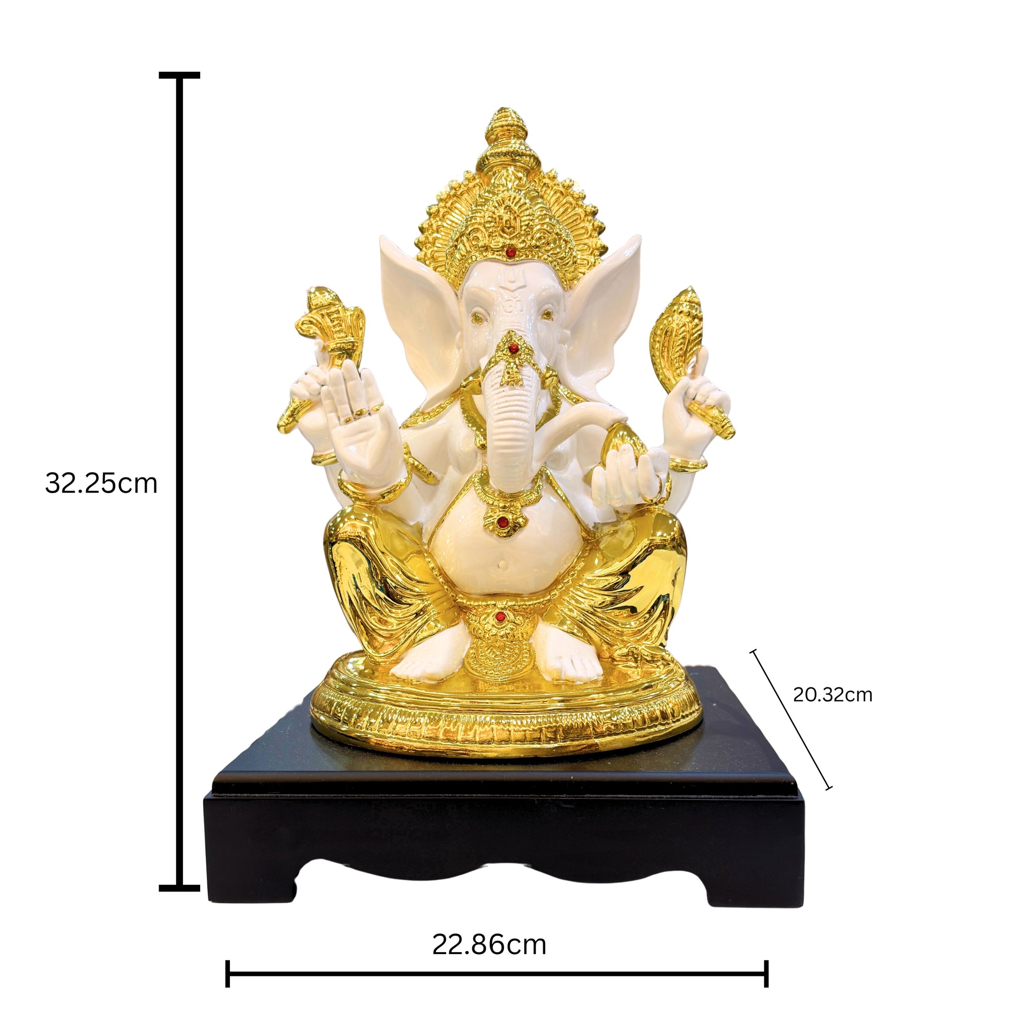 “Decorative Ganpati idol with glossy gold accents – ideal for home temple and festive gifting.”